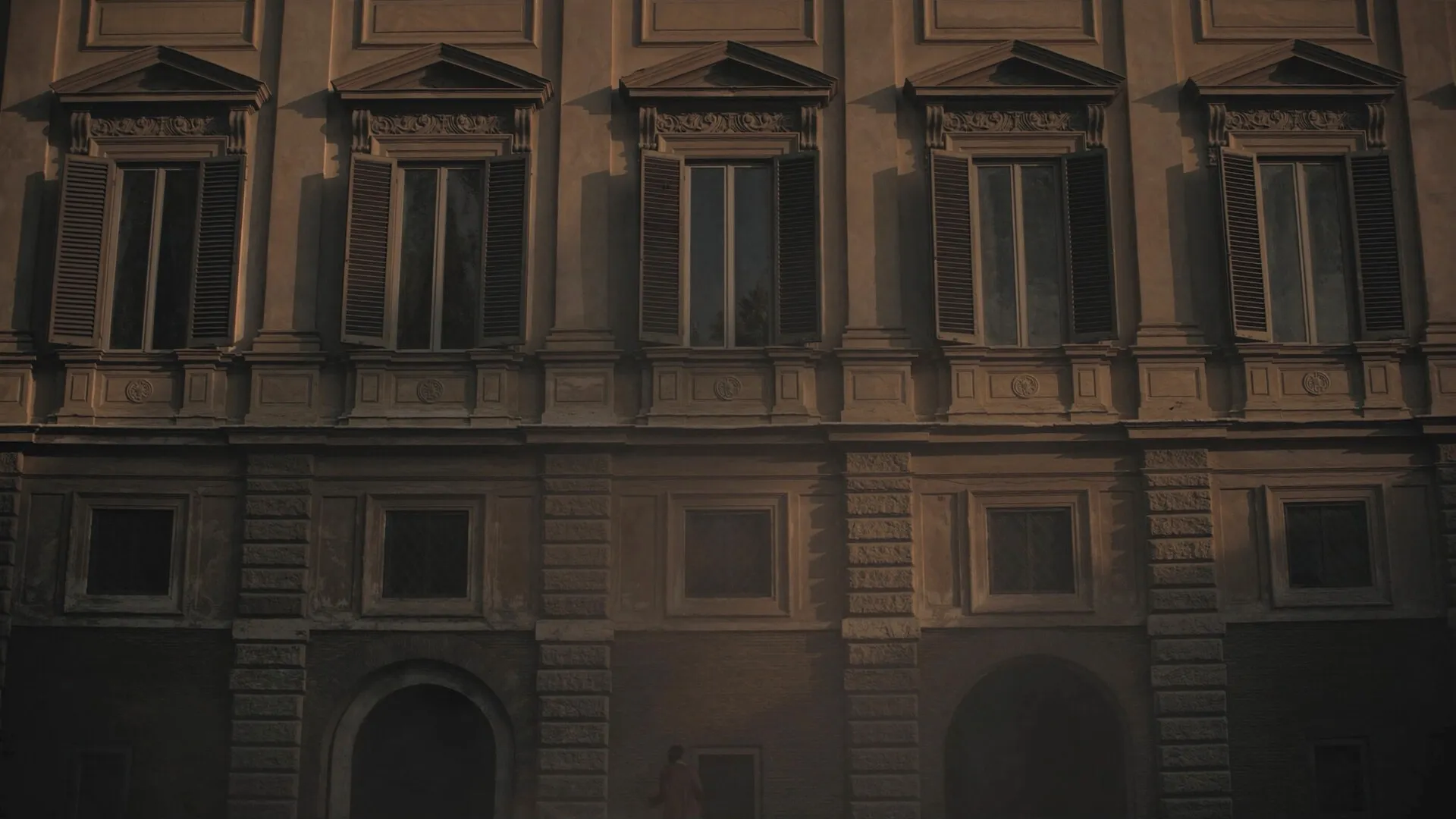 Renaissance palazzo facade in Rome at dusk